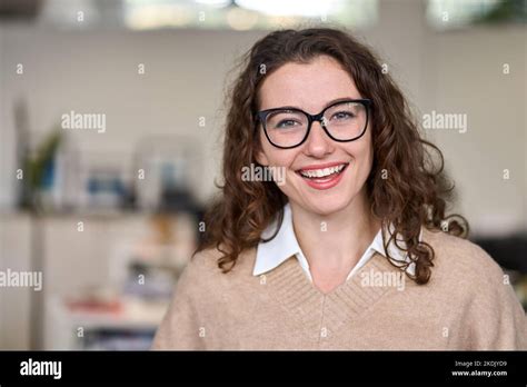 Young Happy Professional Business Woman Wearing Glasses Headshot