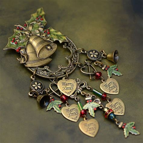 A Bell With Bells And Holly Leaves On It Is Surrounded By Other Charms