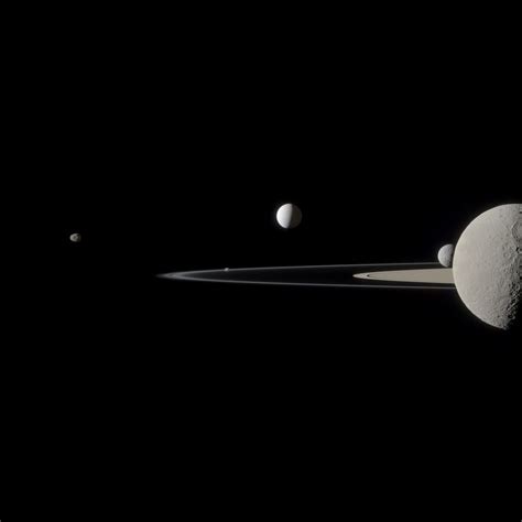 Left To Right Janus Pandora Enceladus Mimas And Rhea And The Thin Ring System From Cassini