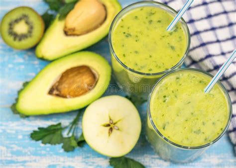 Smoothie Of Avocado With Cut Fruits Of Kiwi Avocado And Herbs Raw