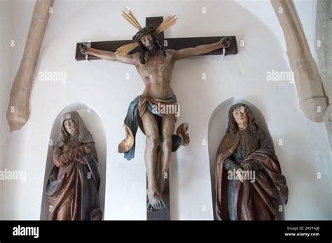 Sculptured Crucifixion Group With A Crucifix And Statues Of Virgin Mary