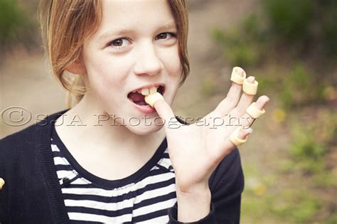 Girl Eating Crisps Young Girl Eating Hula Hoop Crisps Off Flickr