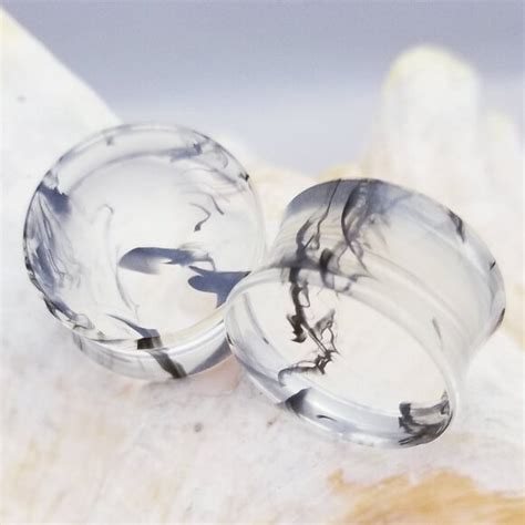 Jewelry Pair 0g 10mm Clear Acrylic With Black Ink Plugs Double Flare