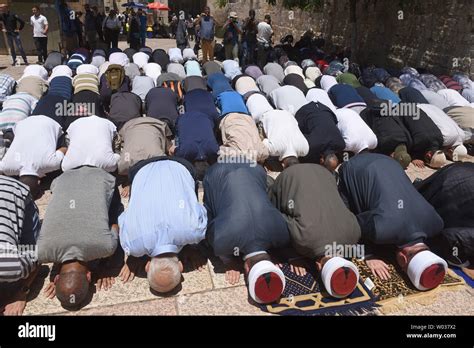 Palestinian Muslims Pray Outside The Temple Mount Also Called Noble