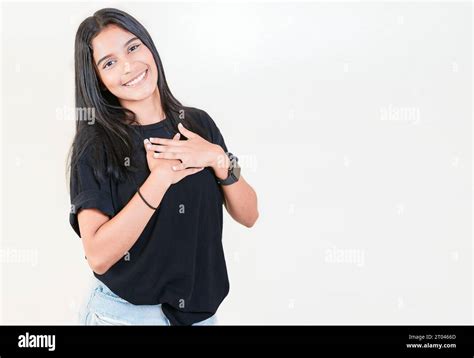 Grateful Teenage Girl Smiling With Hands On Chest Isolated Positive