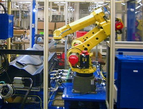 Robotic Fascia Punch And Weld Totally Automated Systems