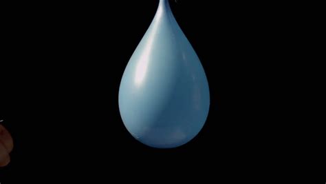 Super Slow Motion Shot Of A Blue Water Balloon Being Popped. Stock Footage Video 3406511 ...