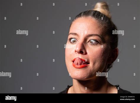 Portraits Of A Blonde Woman With Her Hair Collected In Different Poses And Smiling Stock Photo