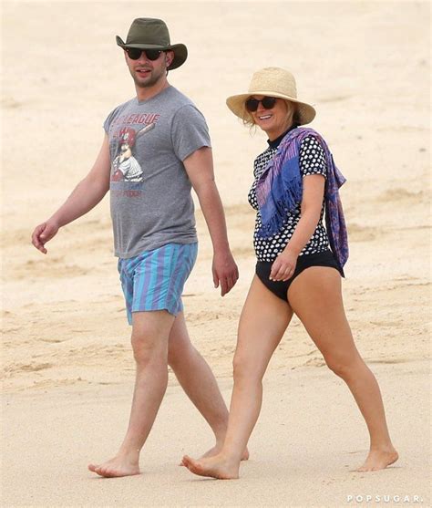 Pin For Later Amy Poehler Slips Into A Swimsuit For A Beach Stroll