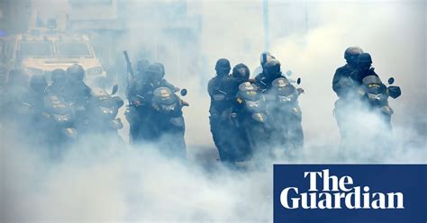 Venezuelan Police Fire Teargas At Street Protesters In Pictures