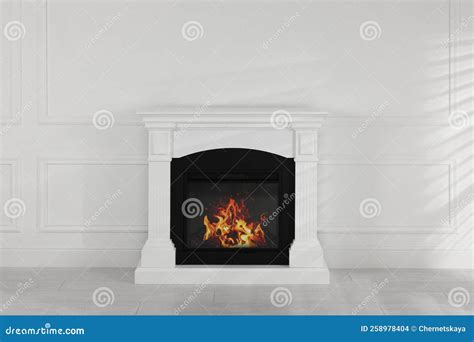 Modern Electric Fireplace Near White Wall in Room Stock Photo - Image ...