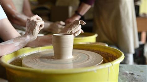 Premium Photo Close Up Shot Of Ceramic Cup Spinning On Potters S