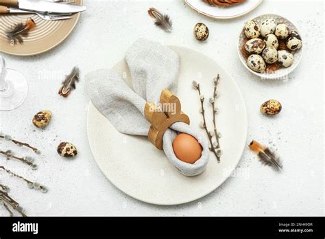 Table Setting With Easter Eggs Pussy Willow Branches And Feathers On White Background Stock