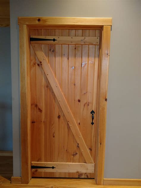 Swinging hinged barn doors - Sashco Log Home Products