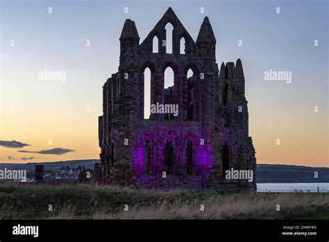 Illuminated Whitby Abbey October 2021 Stock Photo - Alamy