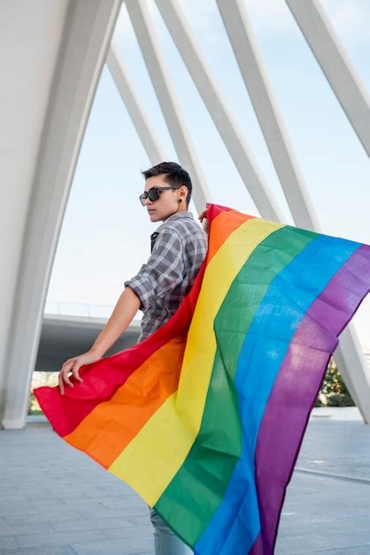 Free Photo Homosexual Holding Rainbow Flag