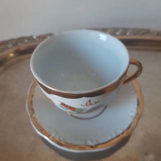 xícara antiga para café em porcelana oriental desenho de dragão e