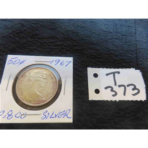 One 1967 Canadian 50 cent piece, 80% silver, uncirculated, ungraded.