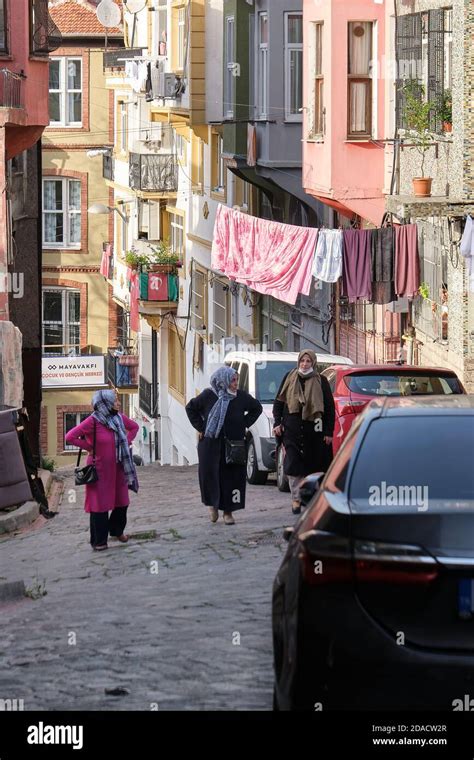 Mature Turkish Women In Hijabs And Wearing Face Masks Under Their Chins