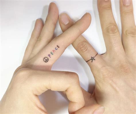 40 Tiny Finger Tattoos That Define Perfection TattooBlend