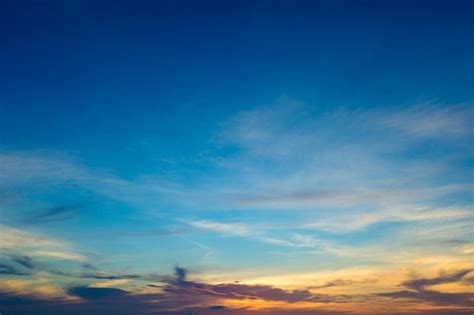 Premium Photo Blue Sky Background With Tiny Clouds