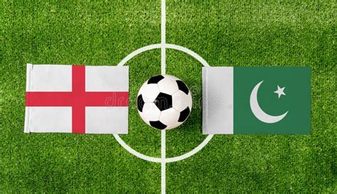 Top View Soccer Ball With England Vs Pakistan Flags Match On Green