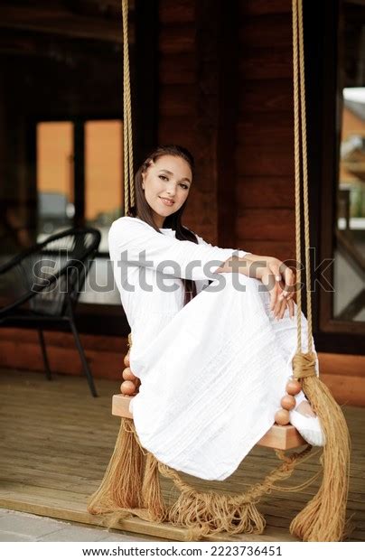 Beautiful Brunette White Dress Poses Sitting Stock Photo Shutterstock