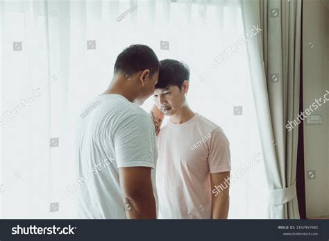 Two Gay Asian Men Bedroom Consoling Stock Photo 2167957685 Shutterstock