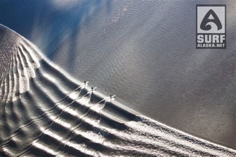 SUP surfers enjoy the Turnagain Arm bore tide