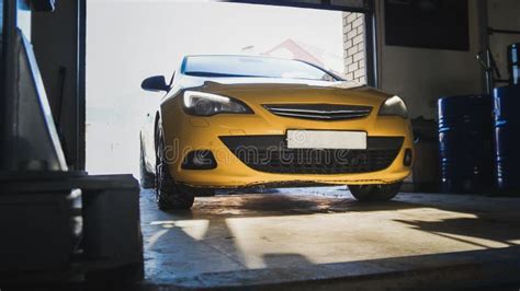 Luxury Yellow Sport Car In Garage Auto Service Diagnostics And