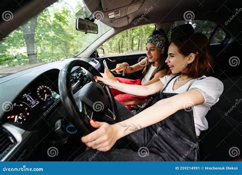 Two Cheerful Young Women Sitting On Car And Taking Selfie Stock Image Image Of Pleasure