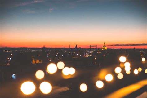 Sunset Cityscape with Bokeh Lights | Free Architecture Image by picjumbo