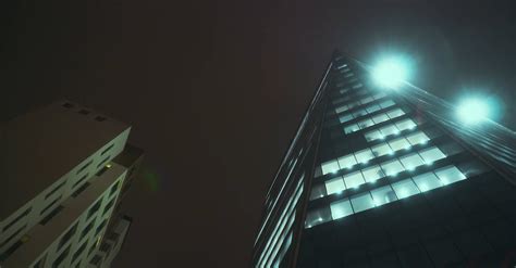 A view of a tall building at night Free Stock Video Footage, Royalty ...