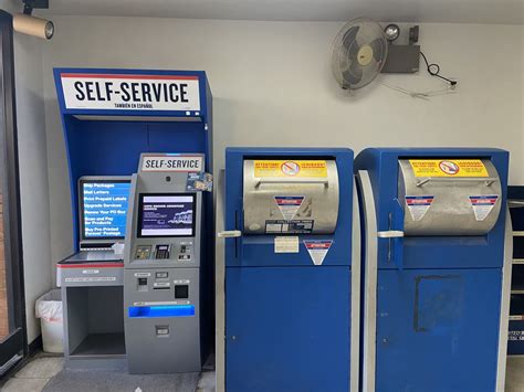 Postal workers explain the pickup schedule for a us post office drop box 3
