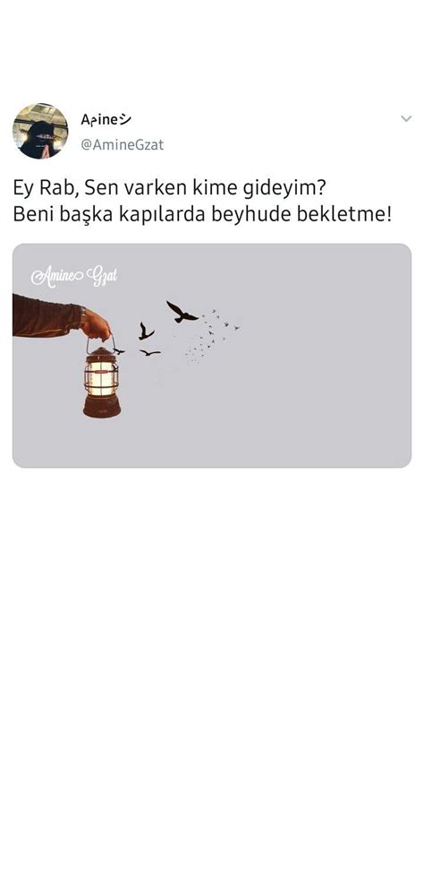 Someone Is Holding A Lantern In Their Hand And The Bird Is Flying Away