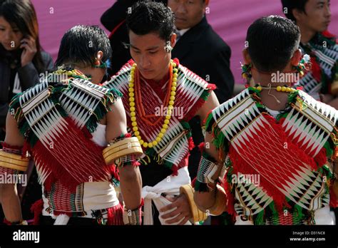 Young men from Angami Naga tribe dressed in traditional clothes, Kohima ...