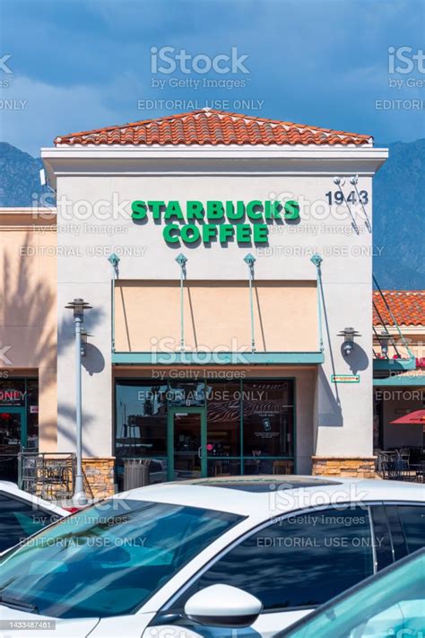 Starbucks Coffee Storefront Sign Stock Photo - Download Image Now ...