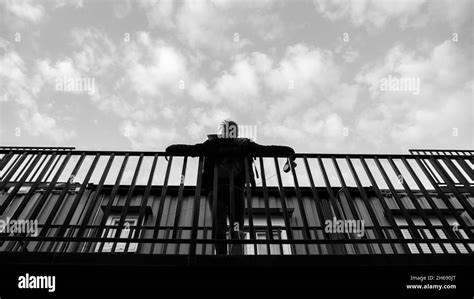 Man Leaning Into The Wind Black And White Stock Photos And Images Alamy