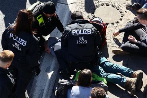 Tempers Fray As Climate Activists Glue Themselves To Roads In Berlin