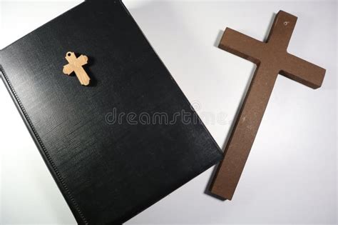 Christian Bible And Wooden Cross On A White Background Stock Image