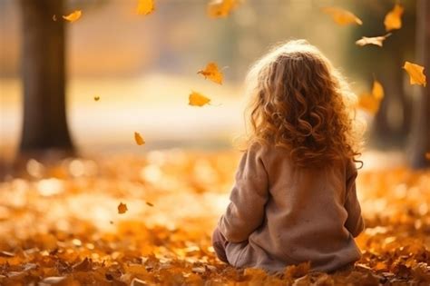 Premium Photo Capturing Autumn Girls Playtime With Leaves