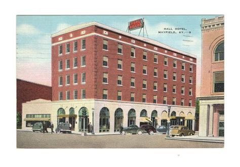 an old postcard shows the front of a hotel