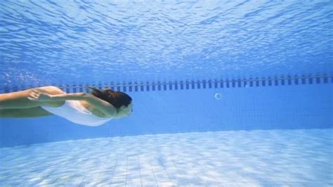 Sexy Woman In White Bikini Diving Into T Stock Video Pond