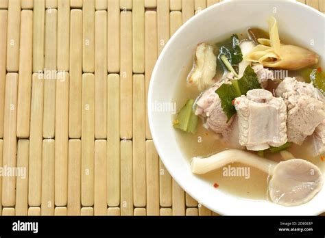 Hot And Spicy Pork Bone With Tamarind And Thai Herbs Soup On Glass Bowl Stock Photo Alamy
