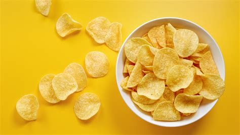 The Reason Some Salt And Vinegar Chip Brands Are More Acidic