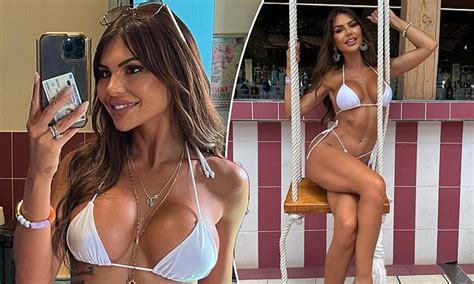 Aussie Tv Star Shows Off Her Eye Popping Cleavage In A Wild Tiny Bikini As She Parties In Ibiza