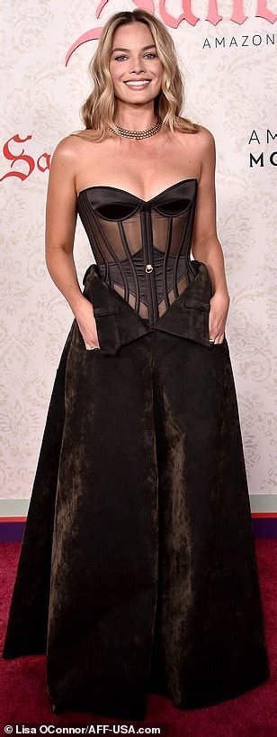 Margot Robbie Stuns In A Sheer Corset As She Joins Glam Carey Mulligan