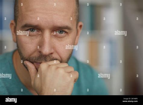 Portrait Of Handsome Mature Man Looking At Camera With Pensive Sight Stock Photo Alamy