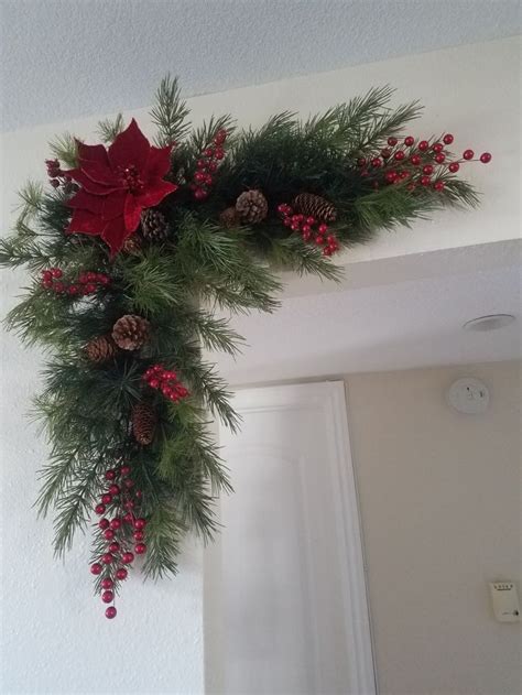 Country Christmas Wreath With Poinsettias And Pine Cones