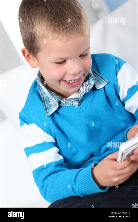 Little Boy Playing With Smartphone Stock Photo Alamy